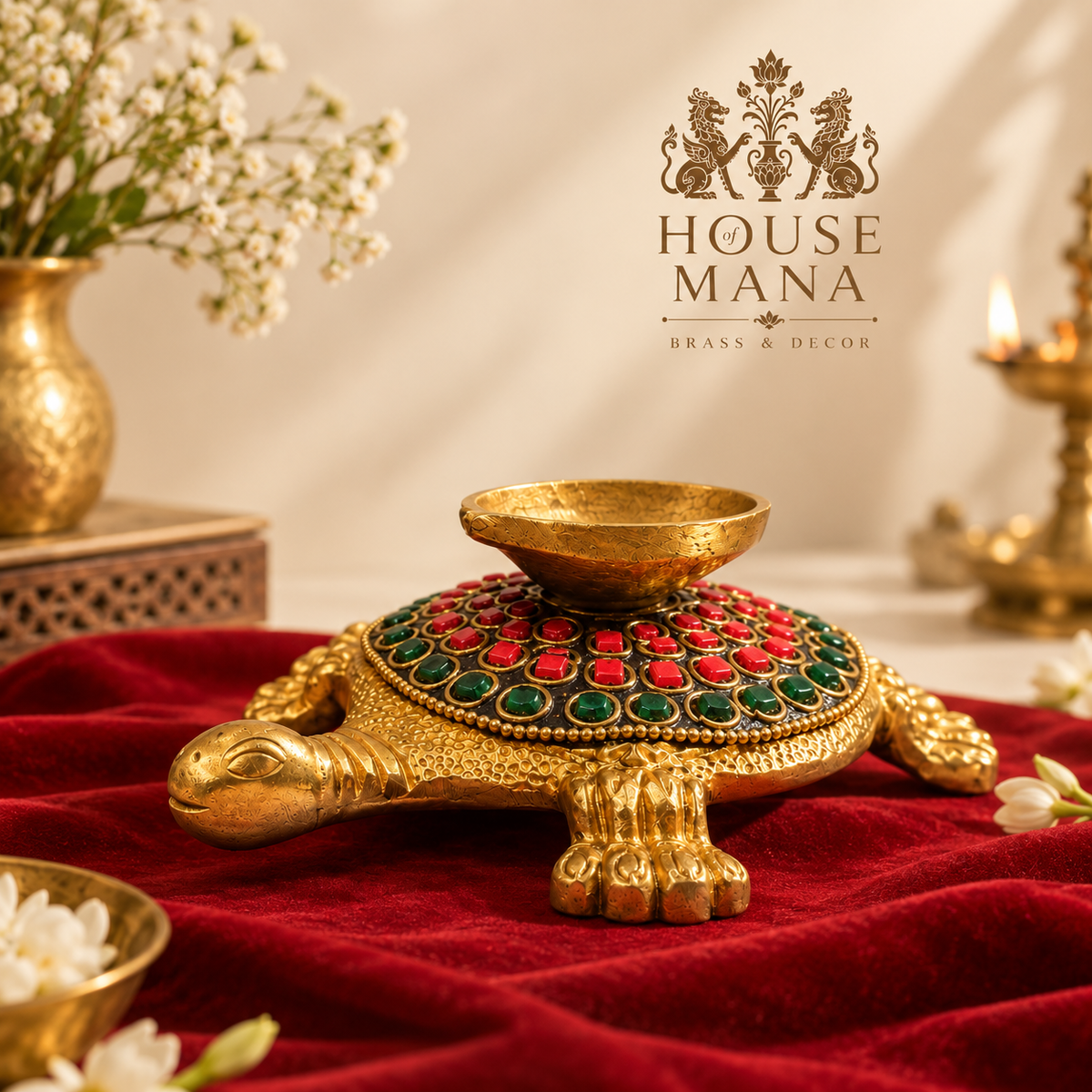 BRASS TURTLE DIYA WITH RED & GREEN STONE DETAILING