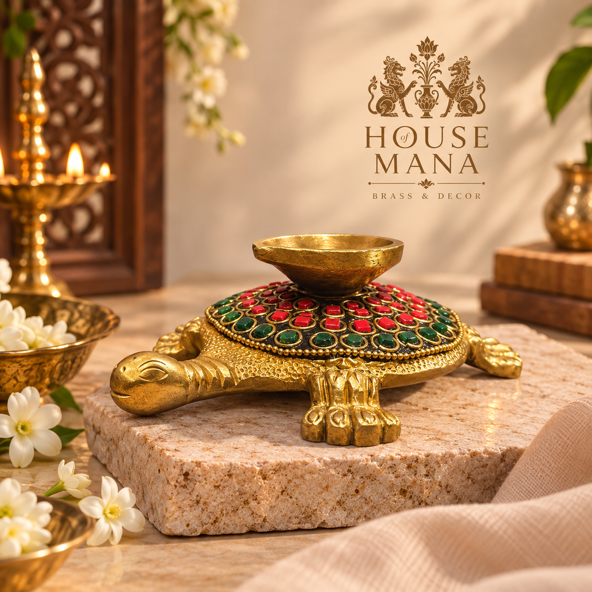 BRASS TURTLE DIYA WITH RED & GREEN STONE DETAILING